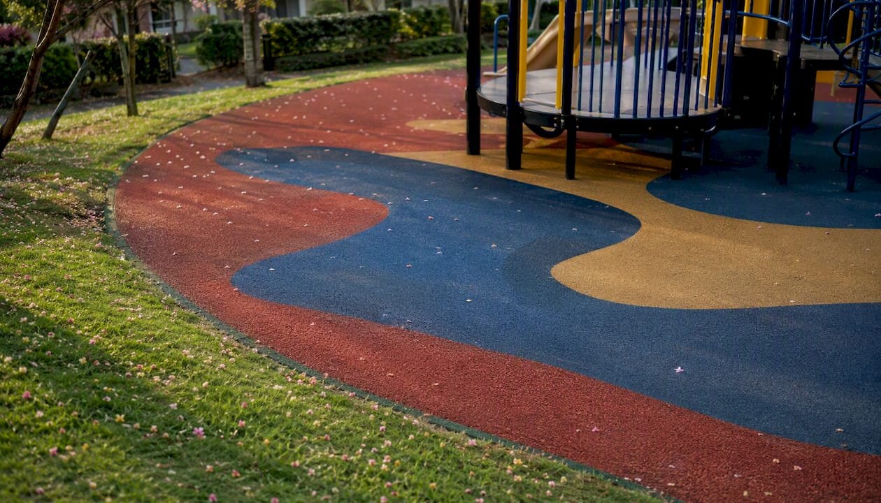 Close-up of poured-in-place rubber playground surface