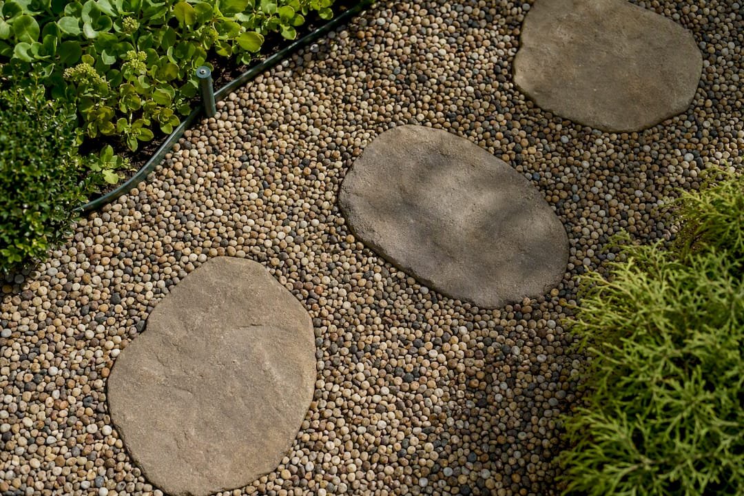 Pea gravel walkway between stepping stones