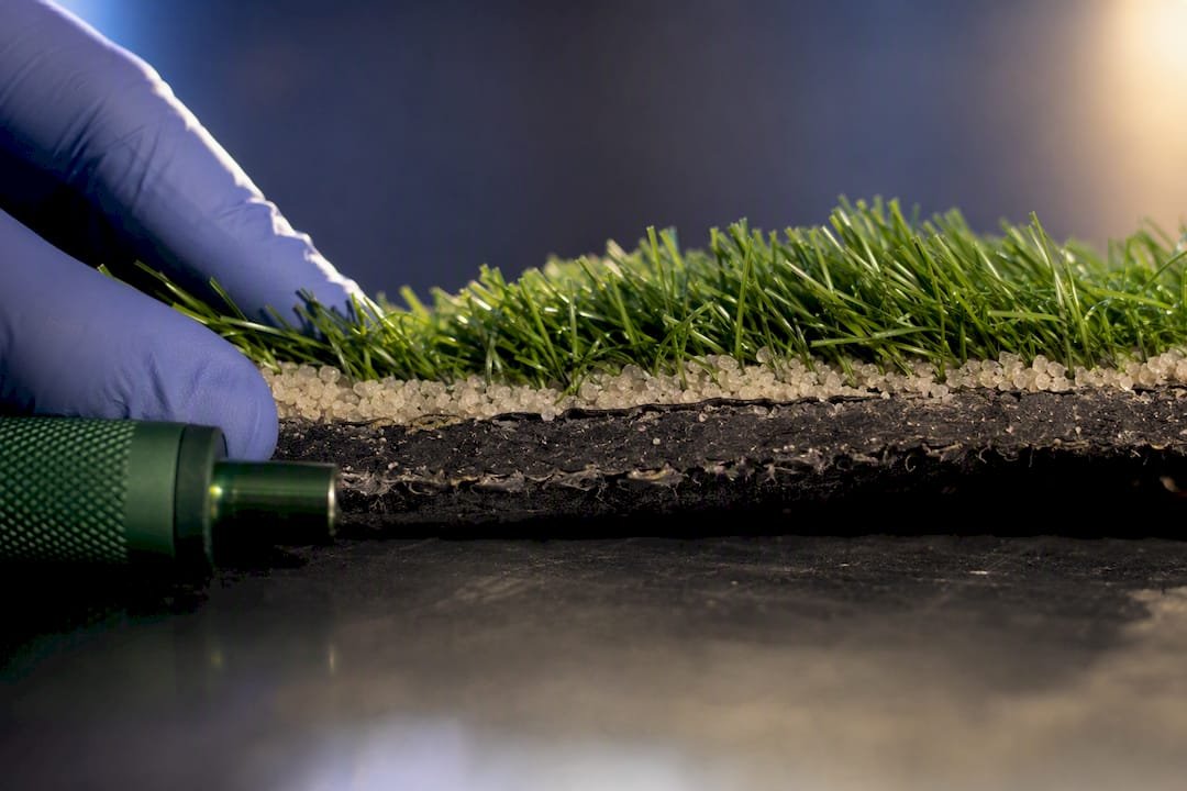 Close-up of artificial turf layers and infill